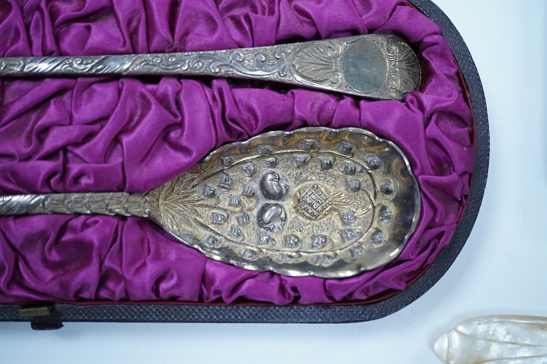 A cased pair of George III engraved silver Old English pattern berry spoons, by Smith & Fearn, London, 1794/5, 22.6cm, together with a cased Edwardian silver christening trio, an 800 standard mustard pot with white metal